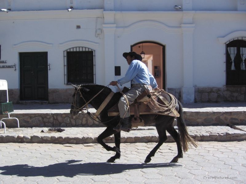 Cachi man riding horse