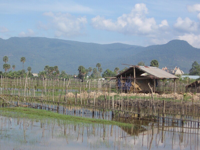Kampot reflection fence water