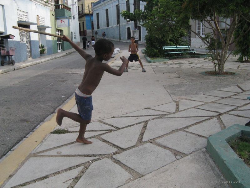 Matanzas boys playing baseball pill bottle sidewalk street