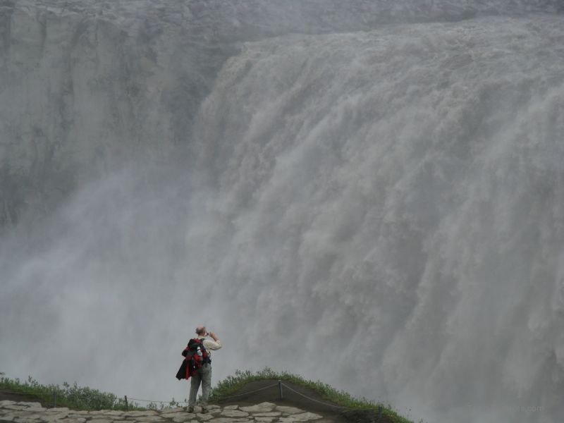 Dettifoss waterfall man