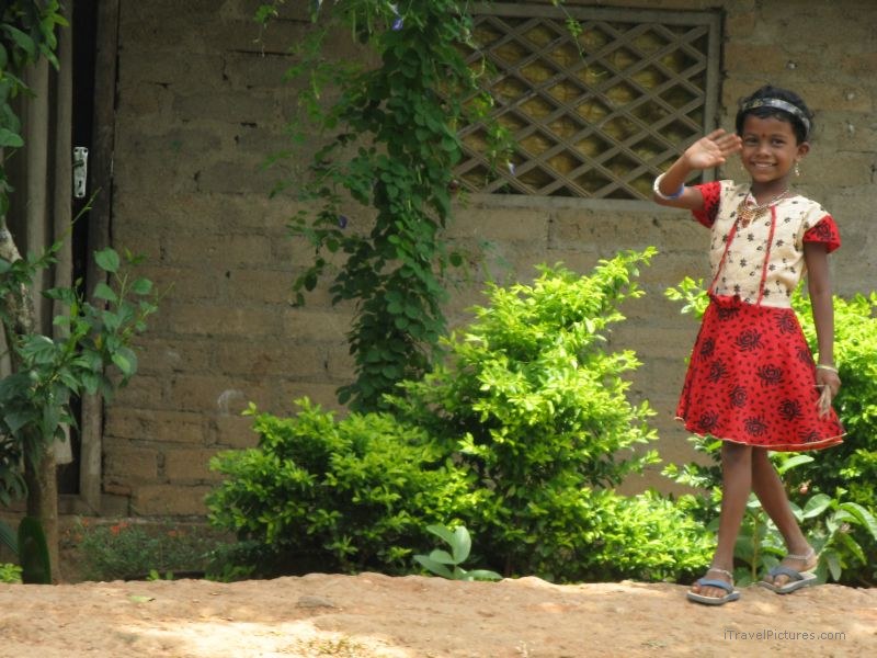 Keralan young girl waving kerala