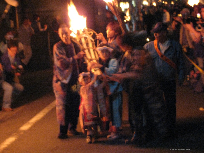 urama fire festival carrying