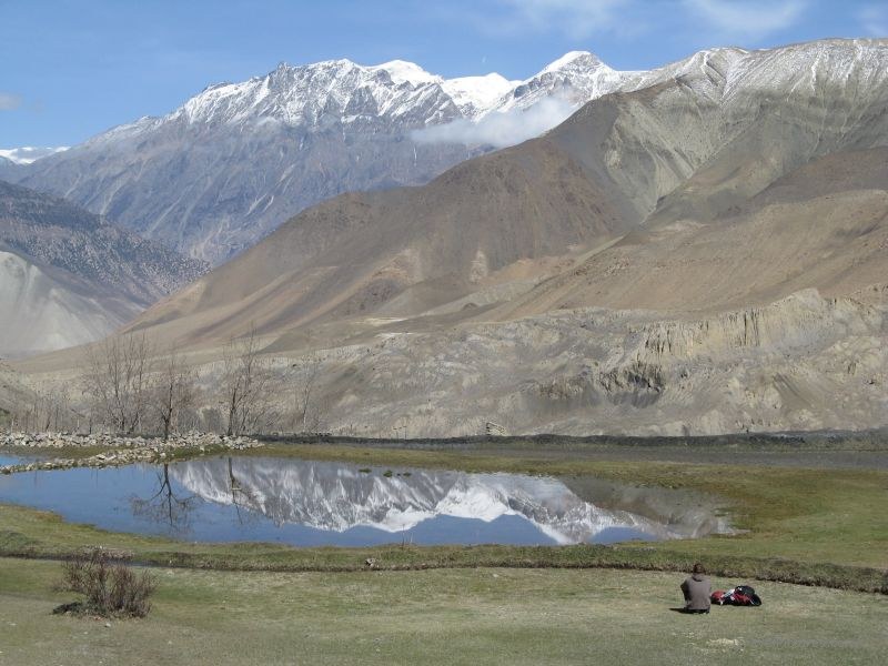 Jomsom trek reflection mountain mountains lake sitting