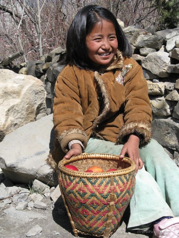 Jomsom trek girl apples basket