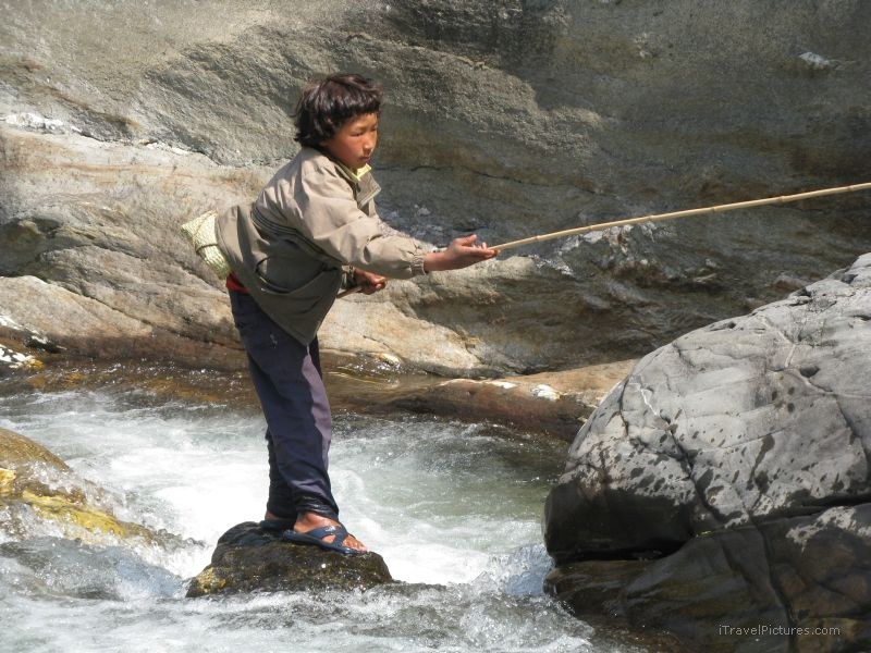 Chaliss boy fishing river