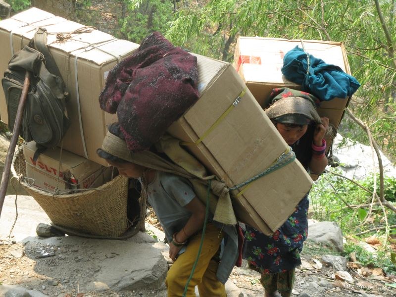 Chaliss carrying solar panels girl woman